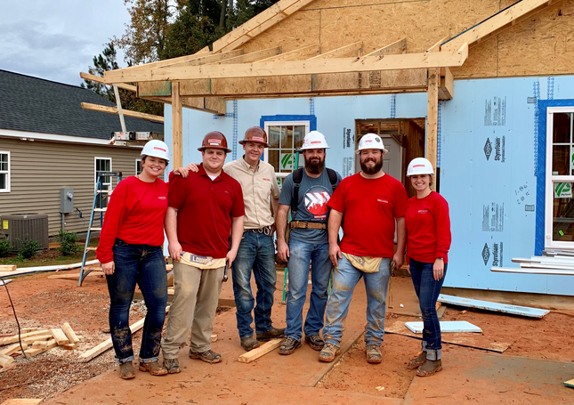 people building a house