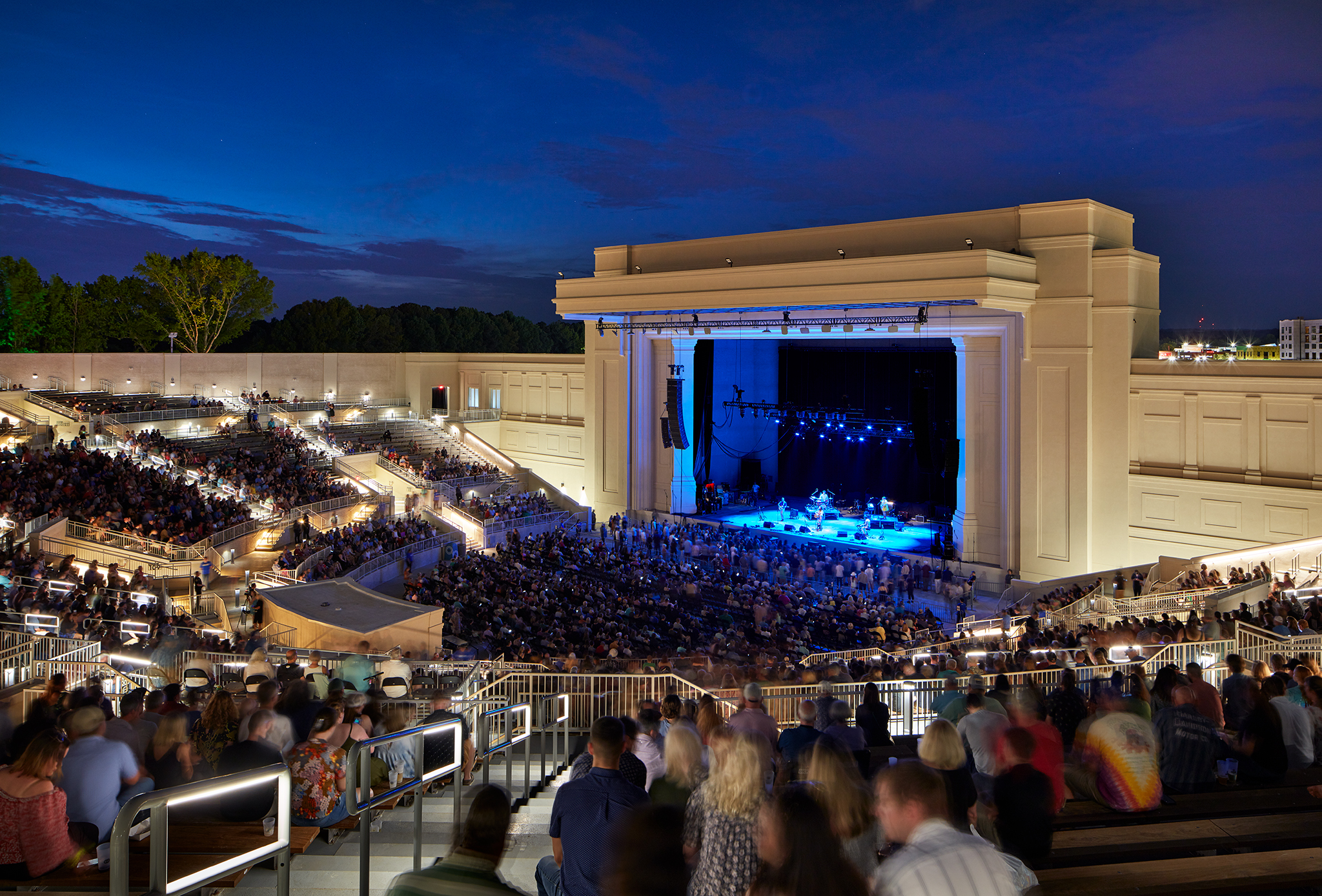 Image of a wide view of the stage and crowd at The Orion Amphitheater