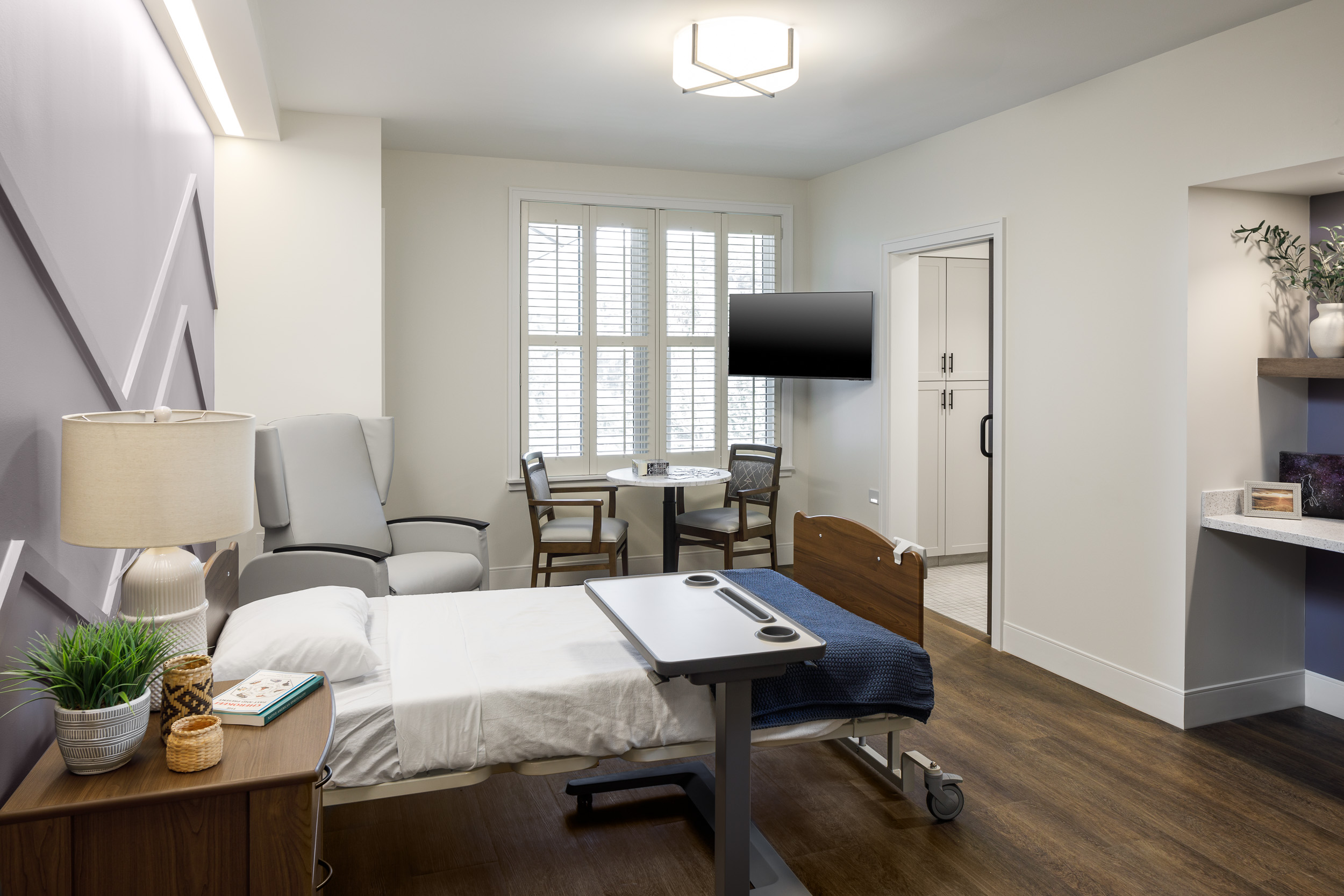Image of a patient room within Tsali Care Center with a hospital bed