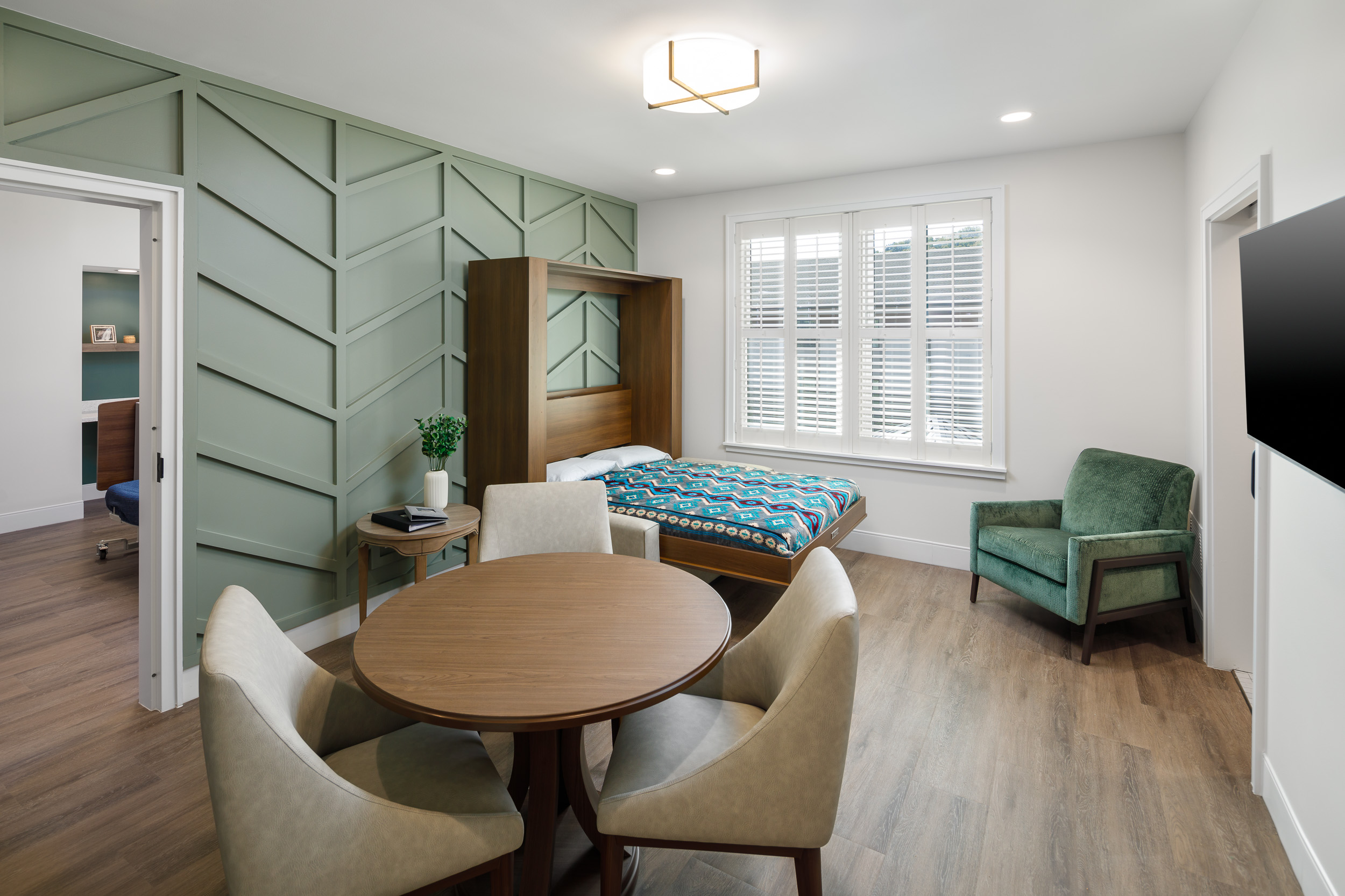 Image of a patient room within Tsali Care Center with a regular bed