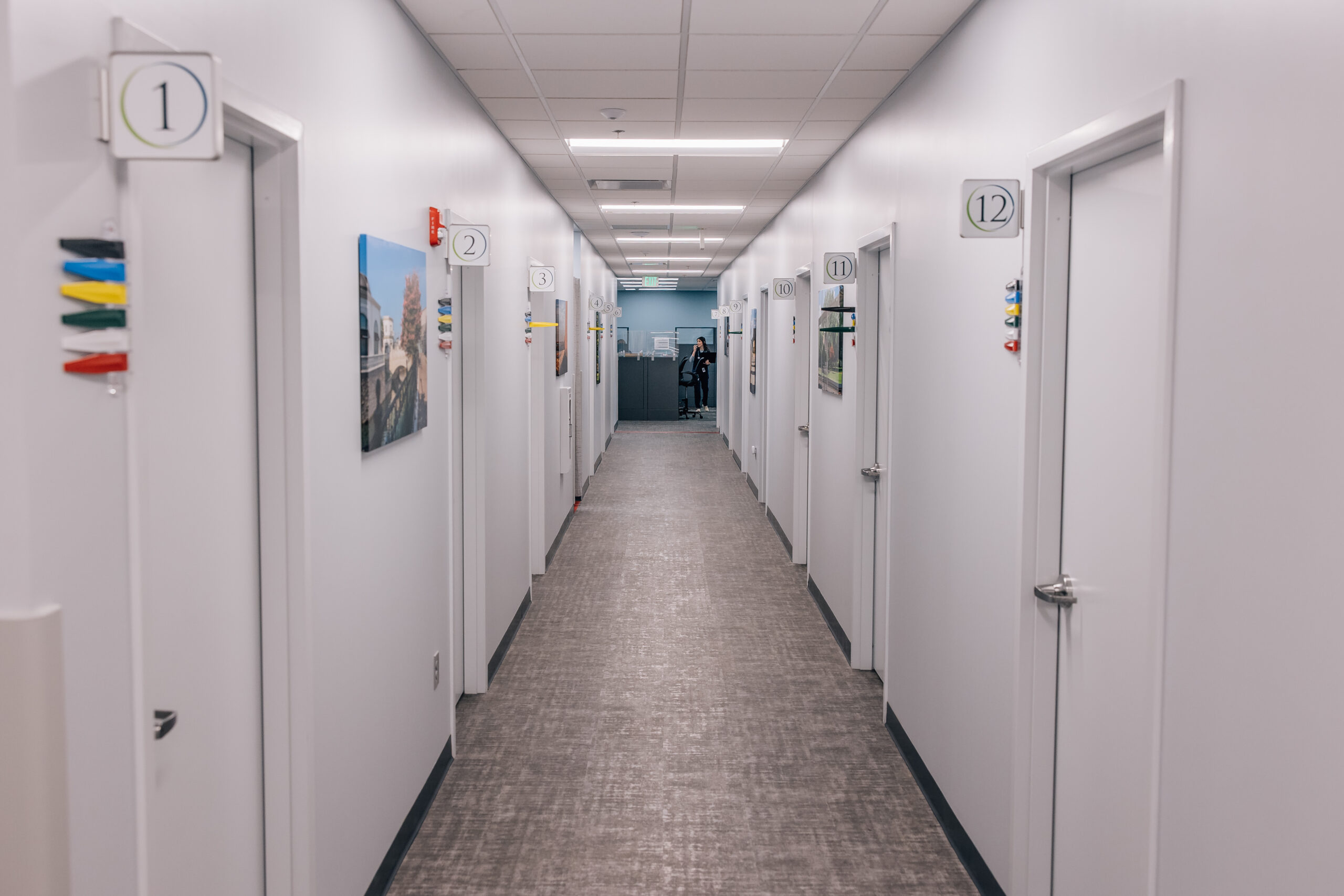 An image of a hallway of exam rooms within Innova Primary Care