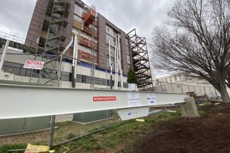 beam in front of an in progress building