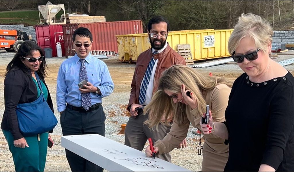 Rheumatology Associates of North Alabama beam signing