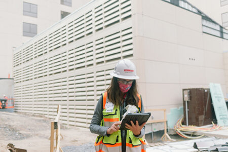 construction worker on an ipad