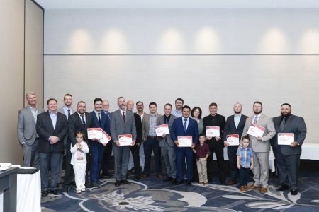 Rocky McMichen Field Leadership Program graduates standing in a group showing off certificates