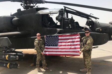 soldiers with a helicopter