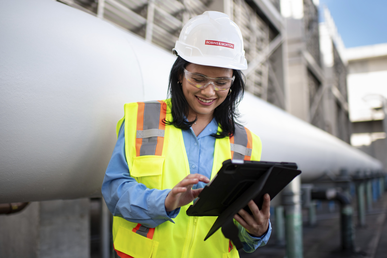 construction worker reviewing plans