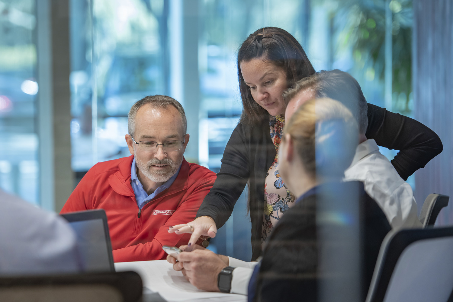 people reviewing information together