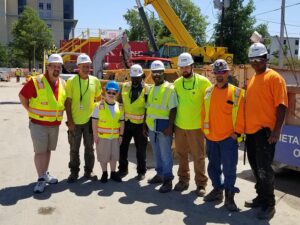 construction workers with child