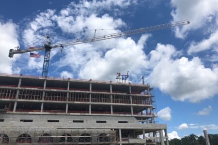 View of a crane at the Halifax Health Medical Center topping out ceremony